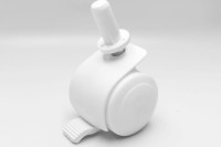 Kółka do łóżeczka białe. Widok na jedno kółko.