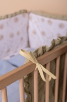 Ochraniacz beżowy na łóżeczko